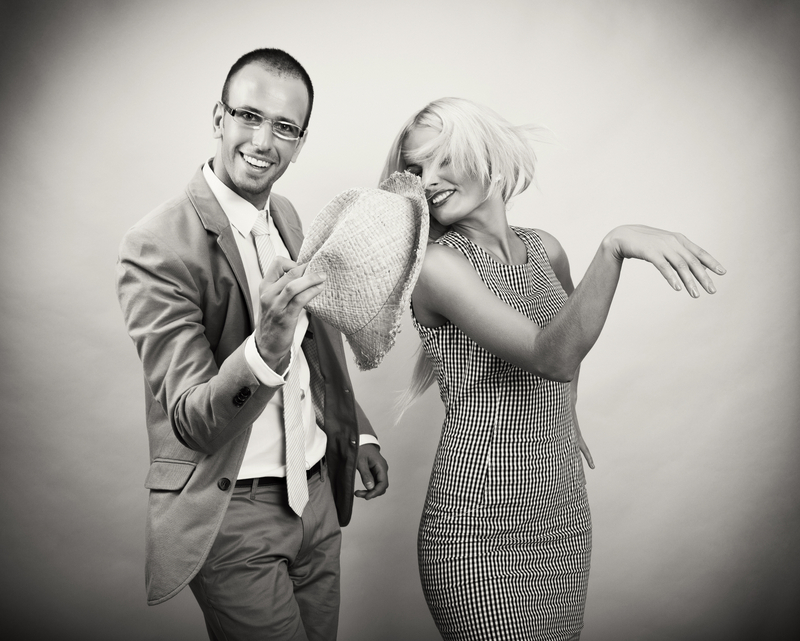 guy and girl dancing black and white